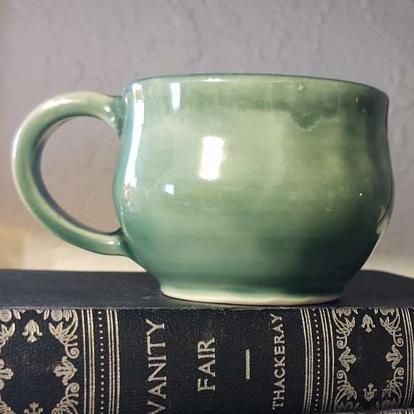 Hand thrown green glazed ceramic pottery mug
